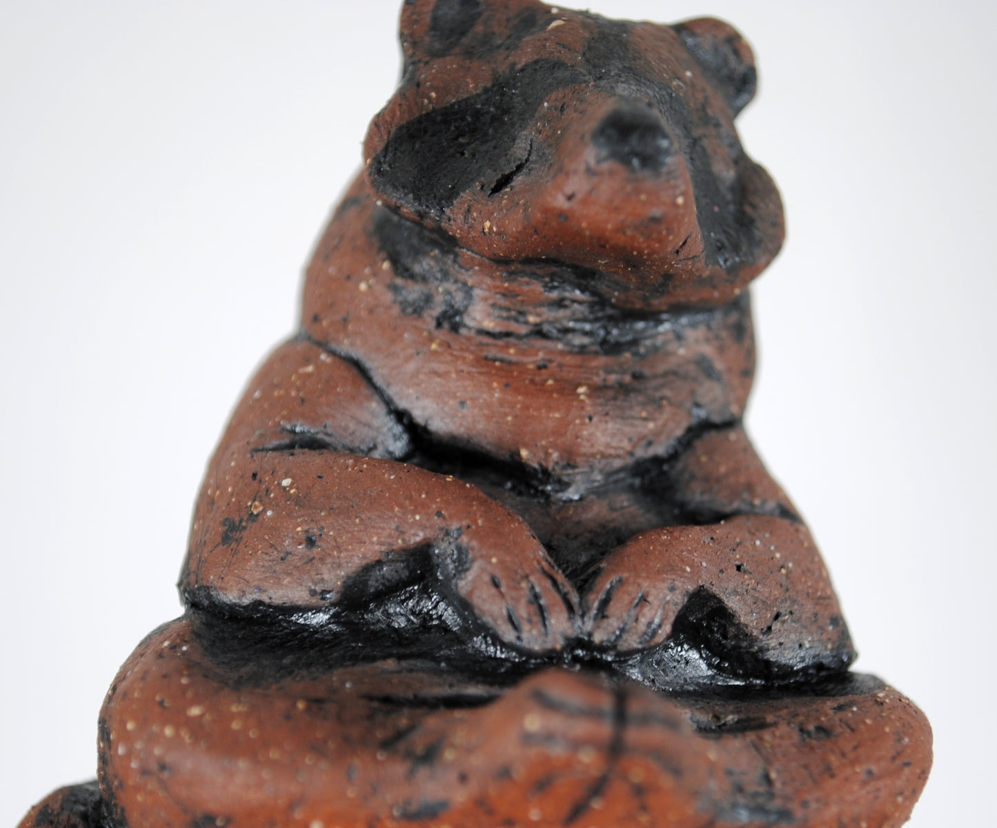 Sitting Raccoon Sculpture