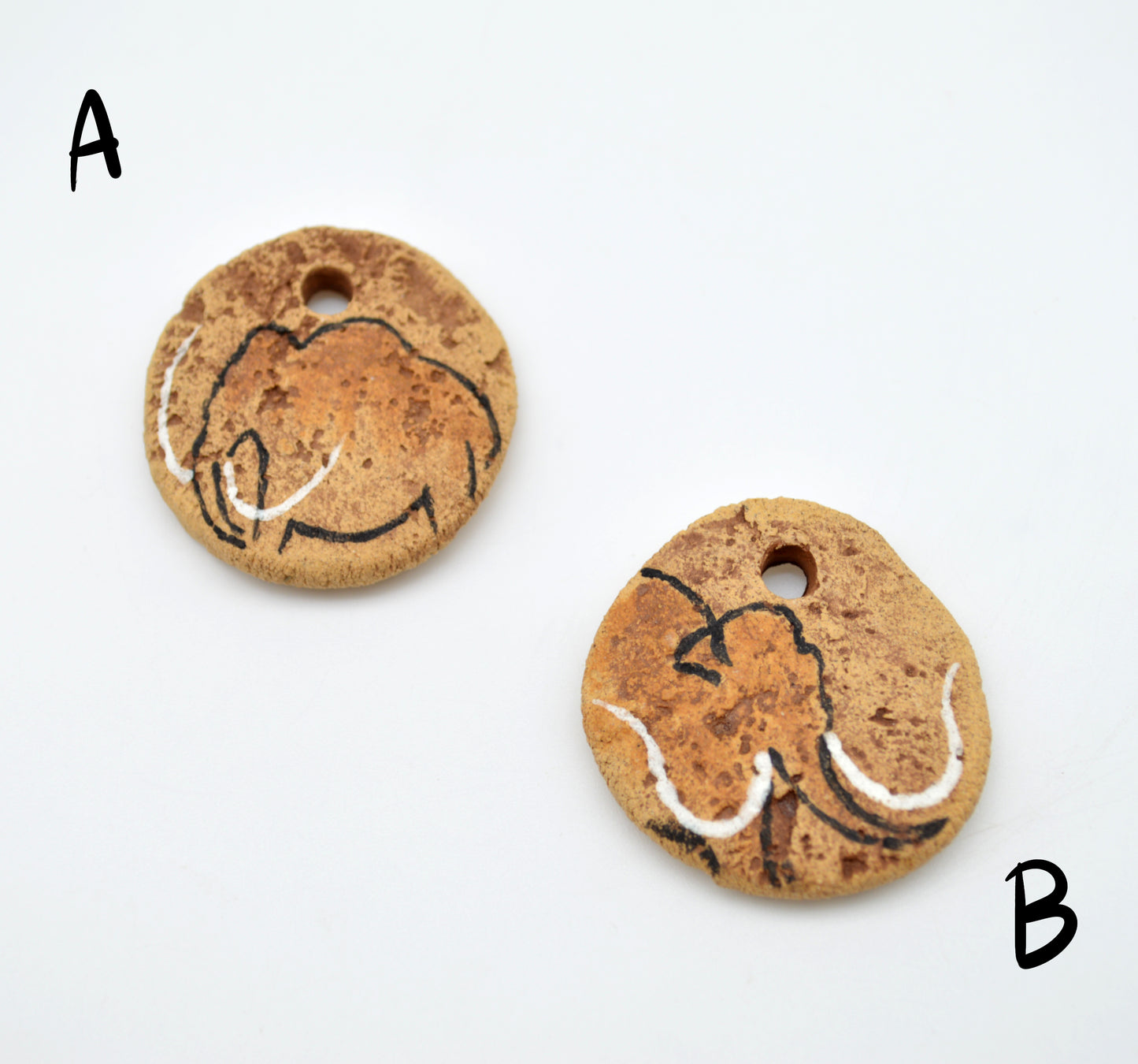 Cave Art Mammoth & Rhino Pendants