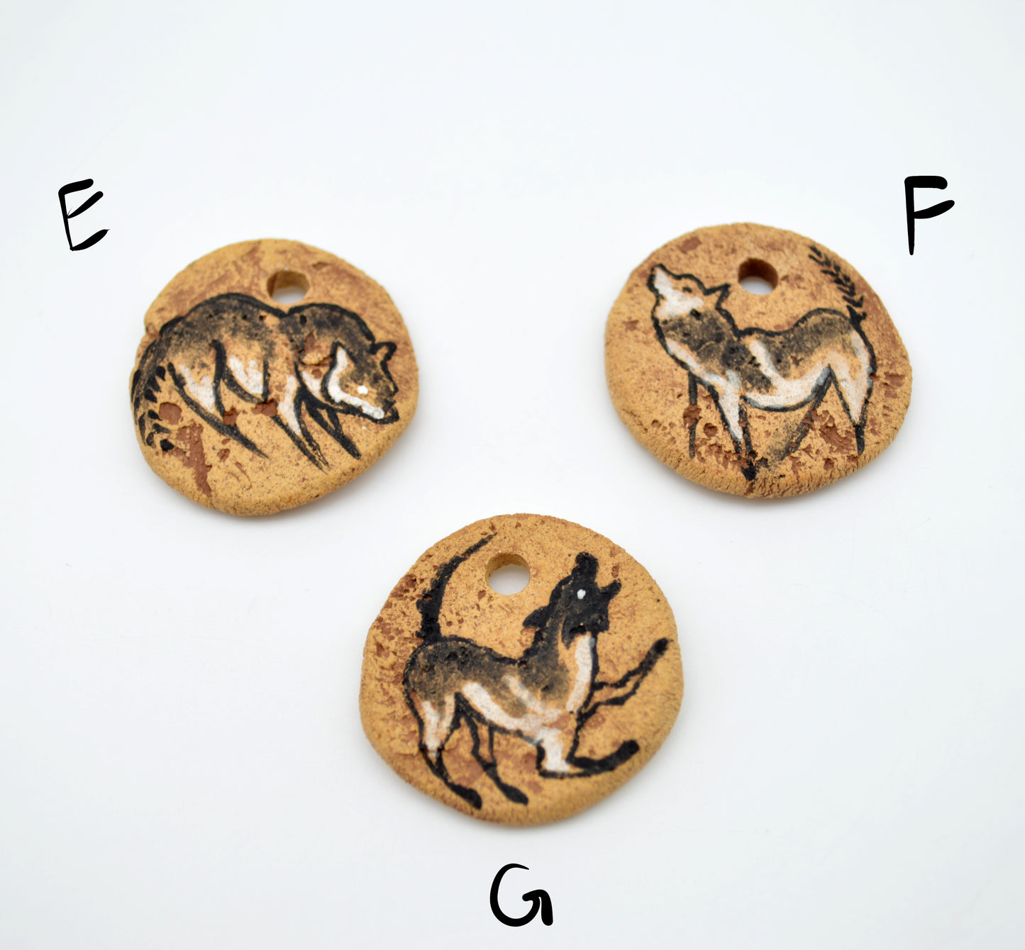 Cave Art Wolf Pendants