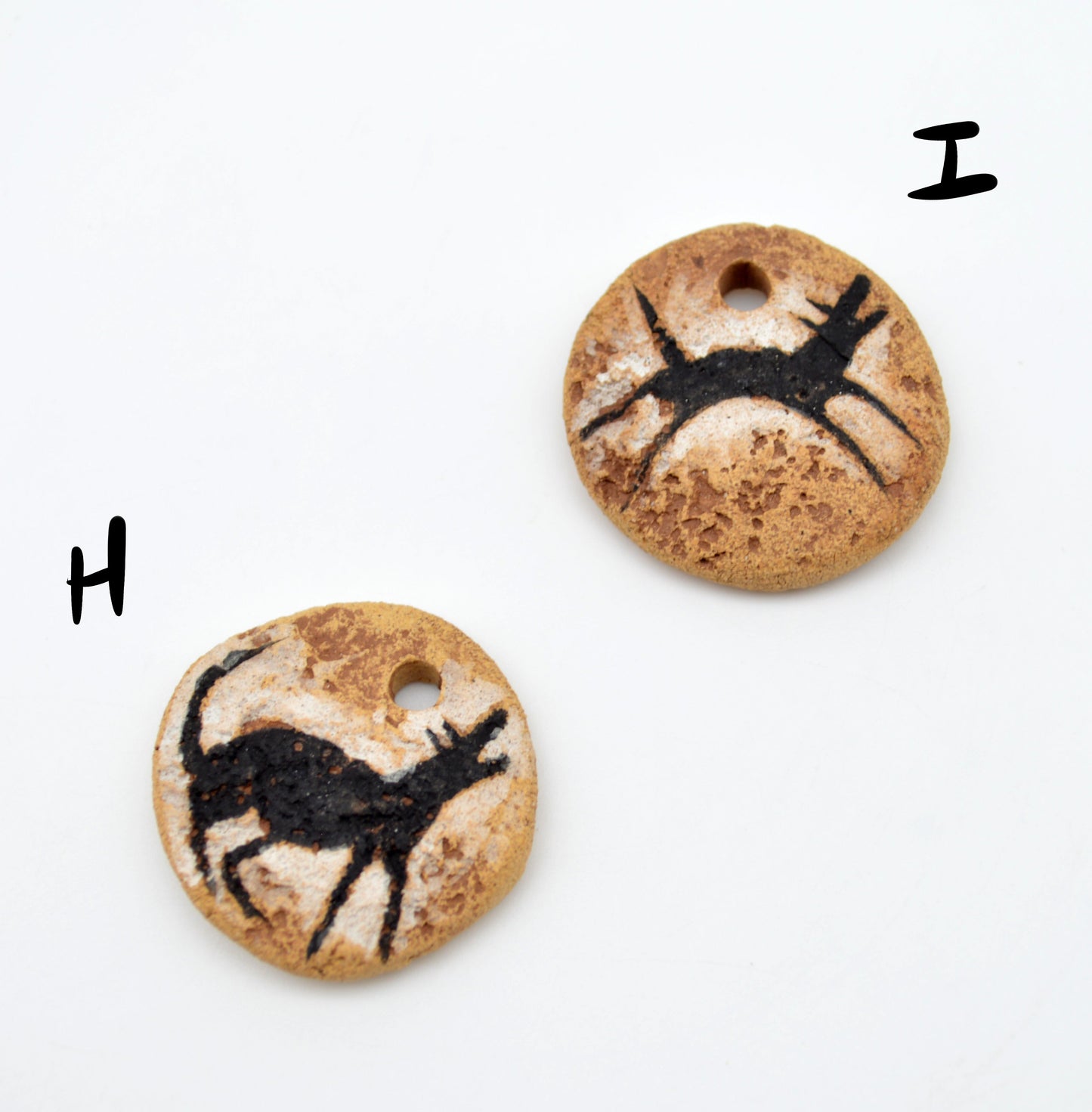 Cave Art Wolf Pendants