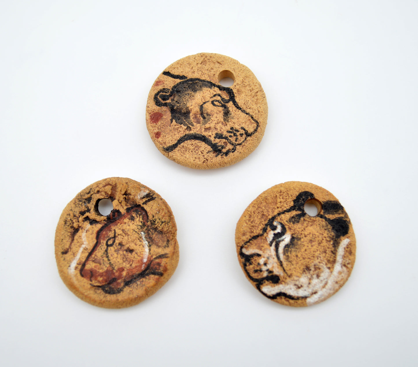Cave Art Lion Pendants
