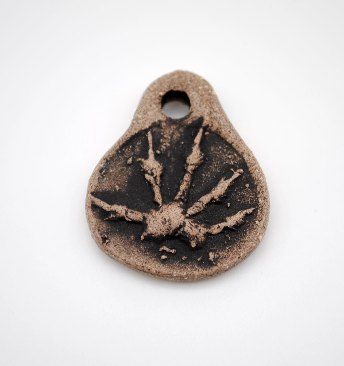 Opossum Paw Pendant