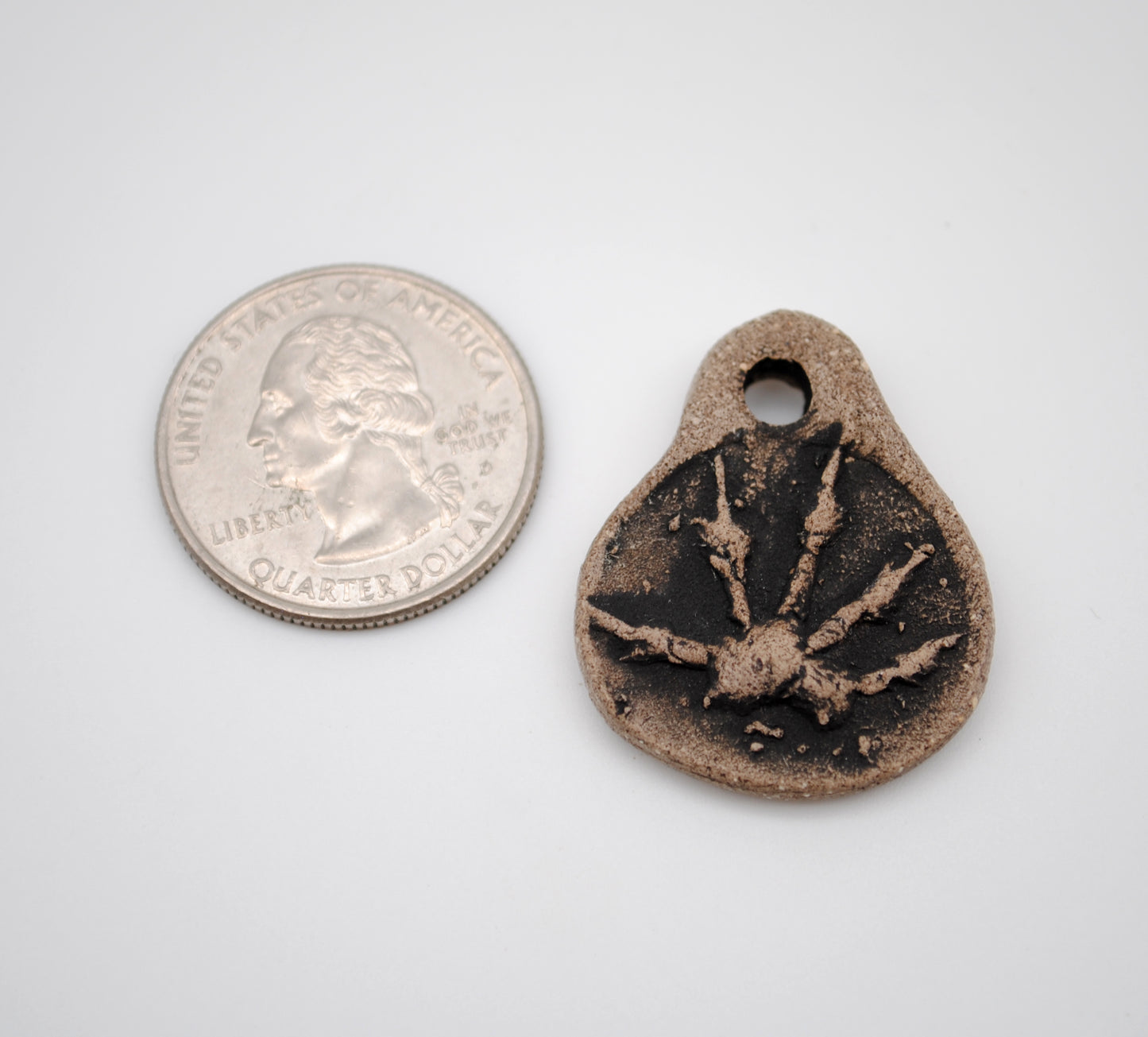 Opossum Paw Pendant