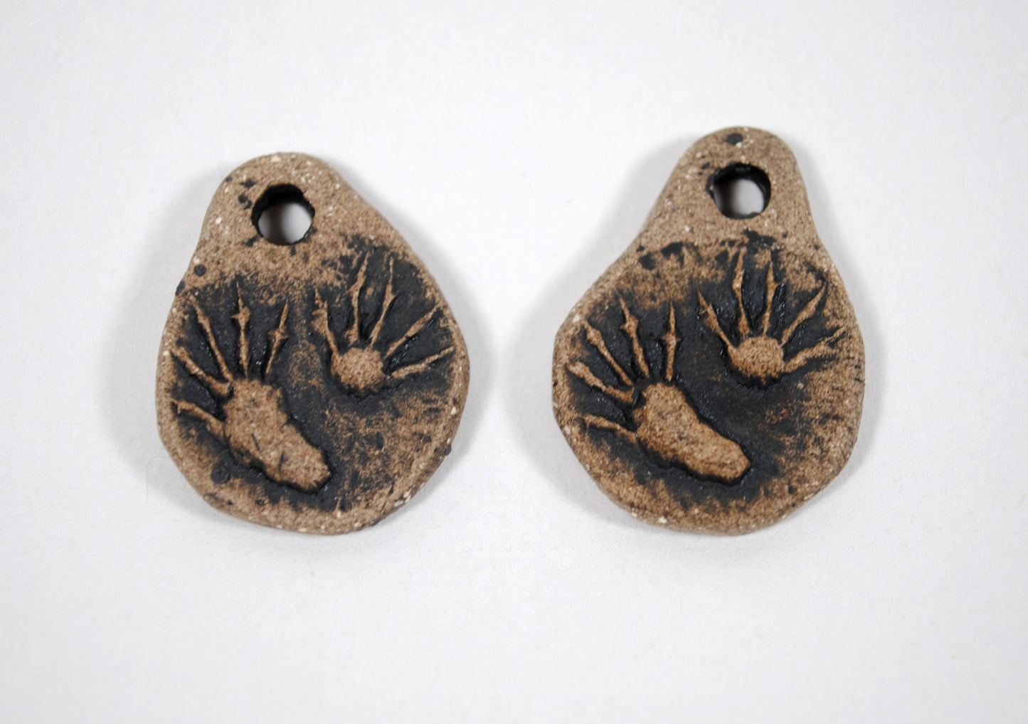Raccoon Paws Pendant