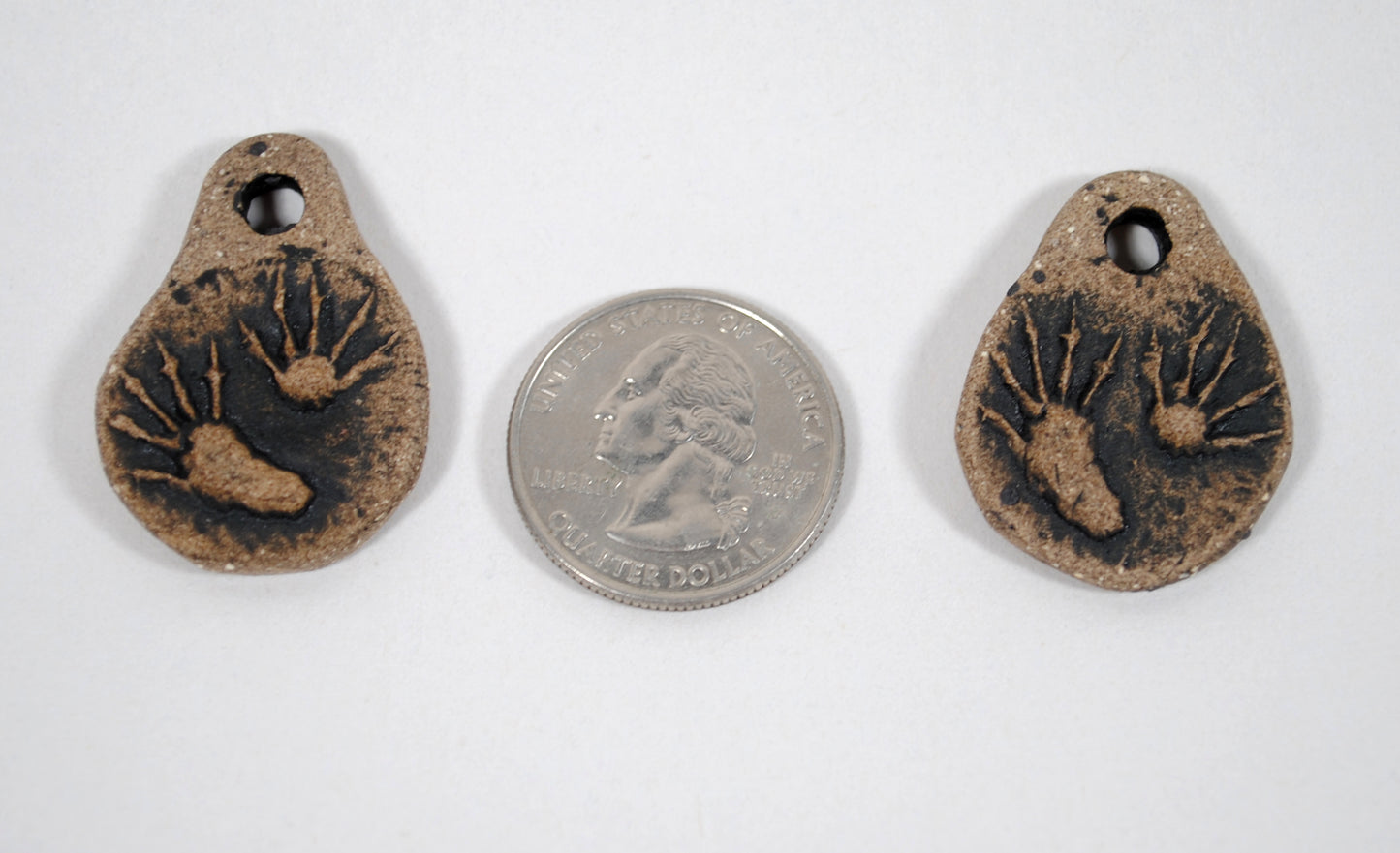 Raccoon Paws Pendant