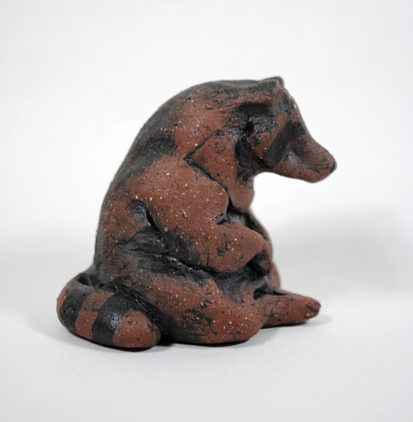 Sitting Raccoon Sculpture