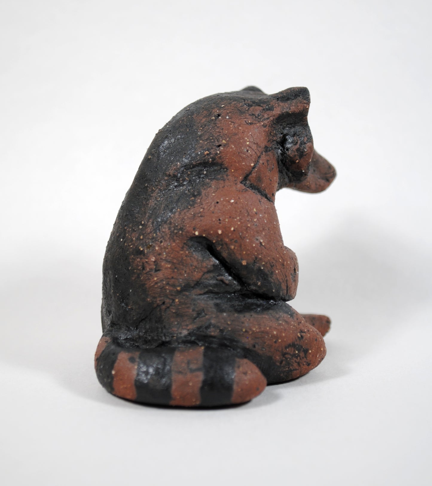 Sitting Raccoon Sculpture