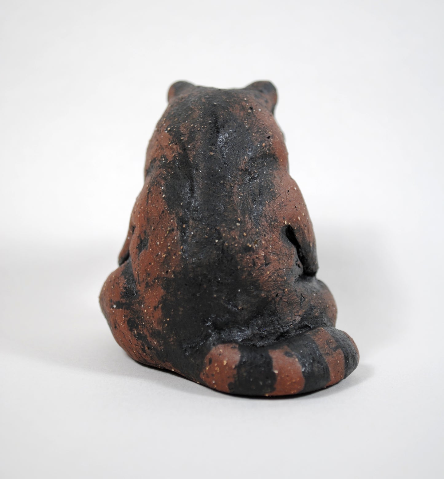 Sitting Raccoon Sculpture