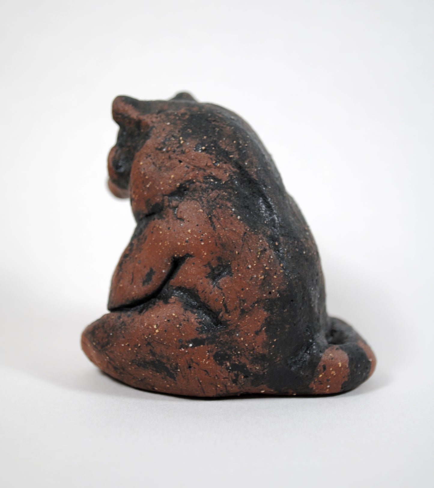 Sitting Raccoon Sculpture